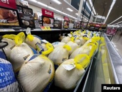 FILE: Turkeys are displayed for sale at a Jewel-Osco grocery store ahead of Thanksgiving, in Chicago, Illinois, Nov. 18, 2021.