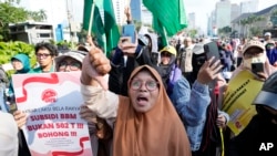 Protesters shout slogans during a rally against sharp increases in fuel prices in Jakarta, Indonesia, Sept. 12, 2022. 