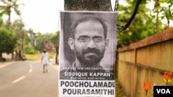 Indian journalist Siddique Kappan's arrest sparked widespread outrage in the country. People fixed posters around his home state in Kerala, demanding his release from jail. (Shaheen Abdulla/VOA)