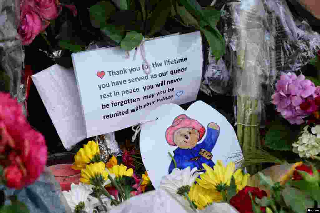 Flowers and notes are pictured at the gate, following the passing of Britain&#39;s Queen Elizabeth, at the Sandringham Estate in eastern England.