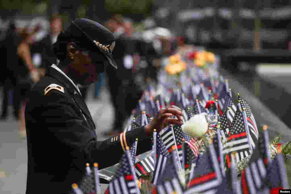 Colonel Davis attends a ceremony marking the 21st anniversary of the September 11, 2001 attacks on the World Trade Center at the 9/11 Memorial and Museum in the Manhattan borough of New York City, Sept. 11, 2022. 