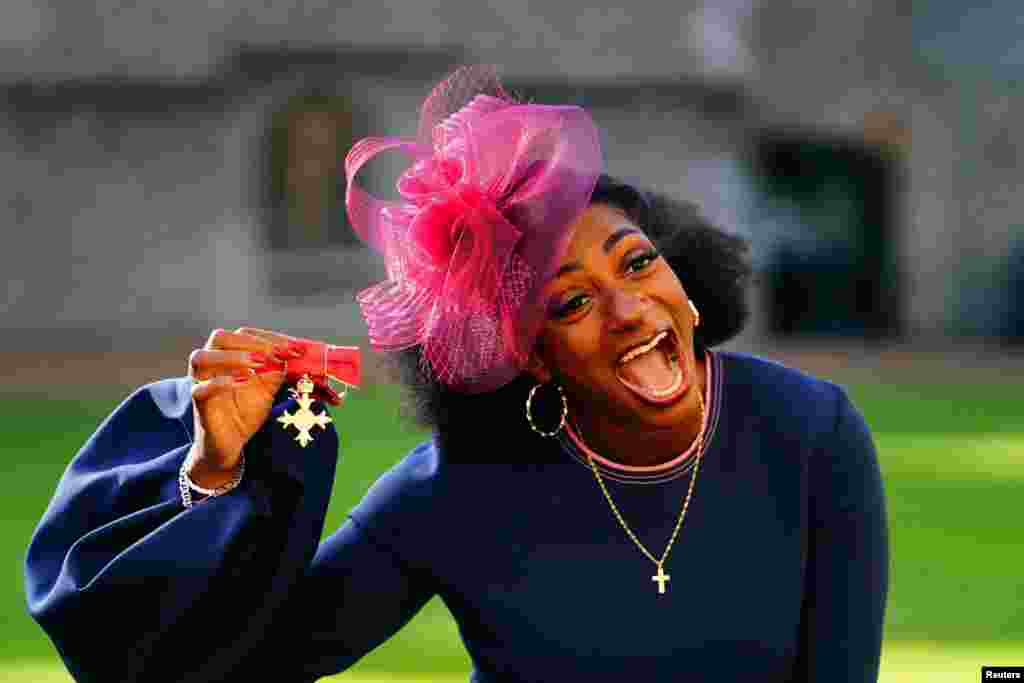 Kadeena Cox is seen after being made an Officer of the Order of the British Empire by King Charles III during an investiture ceremony at Windsor Castle, Berkshire, for services to athletics and cycling.