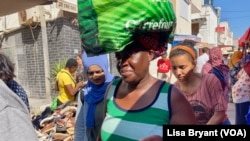 FILE: Tens of thousands of sub-Saharan migrants live in Tunisia, many holding low-paying jobs. Taken by Lisa Bryant, VOA, Nov. 17, 2022.