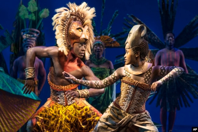 This image released by Disney Theatricals shows Brandon A. McCall as Simba, left, and Pearl Khwezi as Nala during a performance of The Lion King on Broadway in New York on Sept. 14, 2022. (Matthew Murphy/Disney Theatricals via AP)