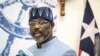 FILE- President of Liberia, George Weah talks to the press at the inauguration of the new Liberian International Ship and Corporate Registry building in Monrovia on November 19, 2021.