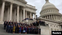 FILE: Members-elect from the U.S. House of Representatives pose for a group photo outside of the U.S. Capitol building in Washington, Nov. 15, 2022.