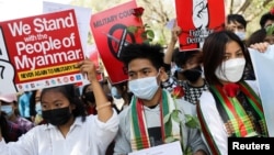 FILE - Myanmar citizens living in India protest the military coup in Myanmar and demand recognition of the National Unity Government of Myanmar, in New Delhi, Feb. 22, 2022. On Nov. 18, 2022, the National Unity Government prepared to open its first office in Washington.