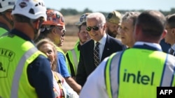 President Joe Biden greets workers at the groundbreaking of the new Intel semiconductor manufacturing facility near New Albany, Ohio, on September 9, 2022. 