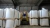 With a forklift, Keenan Kinder moves bags of lithium carbonate in Silver Peak, Nevada, Oct. 6, 2022. Authorities in Botswana are reporting increased thefts of lithium batteries from mobile phone towers amid a surge in global demand for the battery in electric vehicles.