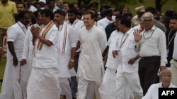 Congress party leader Rahul Gandhi (C) arrives to pay tribute at his father, slain former Indian prime minister Rajiv Gandhi's assassination memorial in Sriperumbudur on Sept. 7, 2022, before starting his party's Kanyakumari to Kashmir rally.