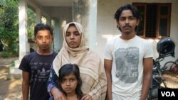 Journalist Siddique Kappan's wife and three children, in their hometown in Malappuram, Kerala, India. (Shaheen Abdulla/VOA)