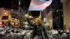 A demonstrator waves a flag during a protest against gender-based violence on the International Day for the Elimination of Violence Against Women, in Istanbul, Turkey November 25, 2021. (Umit Bektas/Reuters)