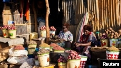 FILE - Women set up their shops at the Konyo Konyo market in Juba, South Sudan, May 12, 2012.