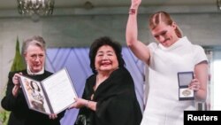 Leader of the Nobel Committee Berit Reiss-Andersen, Hiroshima survivor Setsuko Thurlow and Executive Director of ICAN Beatrice Fihn are seen at the City Hall on the occasion of the award ceremony of the Nobel Peace Prize to ICAN, in Oslo, Dec. 10, 2017.