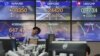 A currency trader watches monitors at the foreign exchange dealing room of the KEB Hana Bank headquarters in Seoul, South Korea, Wednesday, April 29, 2020. Asian stock markets gained Wednesday after France and Spain joined governments that plan to…