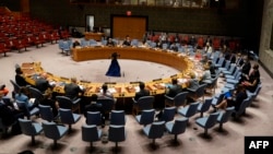 United Nations Secretary-General António Guterres and others gather for a UN security council.