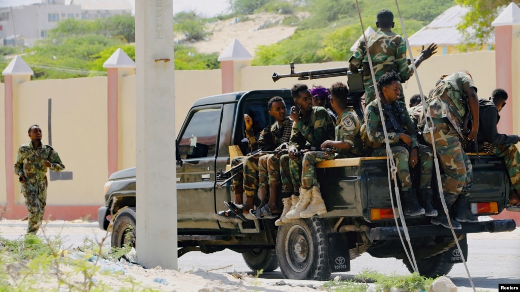 FILE - Somali soldiers are seen riding on a pickup truck in Mogadishu, Somalia, April 27, 2022. 