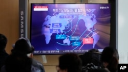 A TV screen showing a news program reporting on North Korea's missile launch at the Seoul Railway Station in Seoul, South Korea, Nov. 4, 2022.