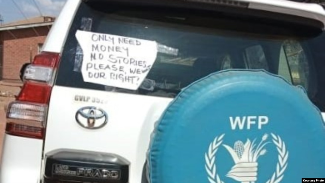 The World Food Program vehicle protesters seized Wednesday, Nov. 2, at Dzaleka refugee camp in Malawi. Refugees are protesting food rations and say they will release the vehicle when their demands are met. (Photo courtesy of protesters.)