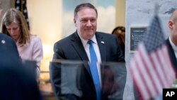 Secretary of State nominee Mike Pompeo leaves a meeting with Sen. Angus King, I-Maine, on Capitol Hill in Washington, April 9, 2018. 