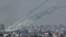 Rockets are launched from the Gaza Strip into Israel, after a temporary truce between Israel and the Palestinian Islamist group Hamas expired, as seen from Israel's border with Gaza in southern Israel.