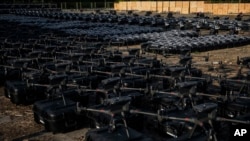 FILE - Hundreds of Ukrainian drones are displayed before being sent to the front line to be used against Russian forces, in Kyiv, Ukraine, July 25, 2023. 