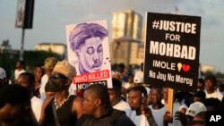 FILE - People chant slogans during a protest on the streets of Lagos, Nigeria, Thursday, Sept. 21, 2023, to demand justice following the mysterious death of Afrobeat star Mohbad.