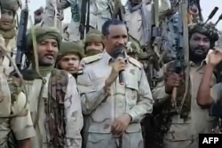 FILE - An image grab taken from a video of the Sudanese paramilitary Rapid Support Forces made July 28, 2023, shows its commander, General Mohamed Hamdan Dagalo, addressing RSF fighters. (RSF handout/AFP)