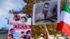 FILE - People hold placards bearing portraits of Iranian rapper Toomaj Salehi, right, who was arrested in Iran, and portraits of children who were killed during protests in Iran, during a rally in support of Iranians in Istanbul, Nov. 26, 2022.