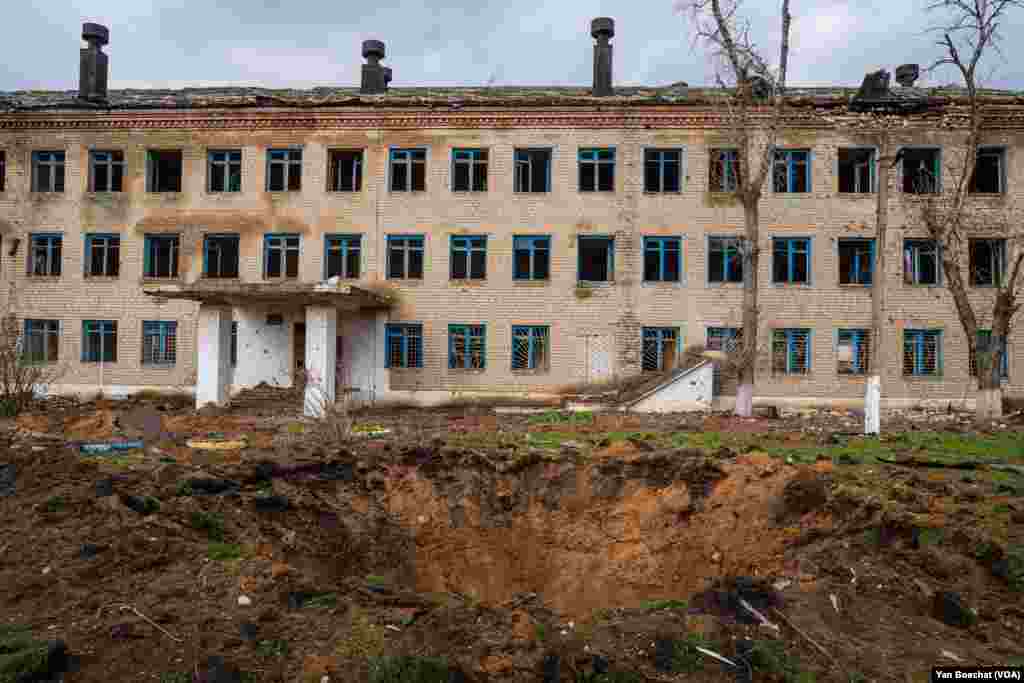 One of many craters caused by the constant shelling from Russian artillery against the town of Siversk, located just a few kilometers of the front line in the Donbas region, Eastern Ukraine, April 4, 2023.