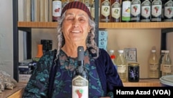 Fakhria Elia has been making wine for almost 50 years, and it is sold at the family’s liquor store in Shaqlawa, Iraqi Kurdistan, in this Jan. 18, 2023, photo.