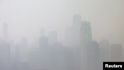 Smoky haze from the wildfires in Canada blankets Chicago, Illinois, June 28, 2023. 