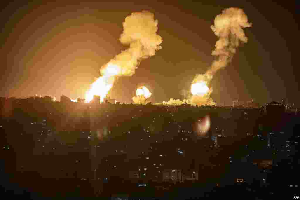 Explosions are seen in Khan Yunis in the southern Gaza Strip during Israeli airstrikes on the Palestinian enclave.