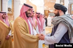 Taliban Defense Minister Yaqub Mujahid, right, greets Saudi Crown Prince Mohammed bin Salman. (Source: Taliban Defense Ministry social media)