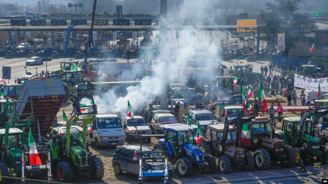 Farmers gather with their tractors near the highway junction, in Orte, Italy, Feb. 3, 2024. Farmers have been protesting in several parts of Italy and Europe against EU agriculture policies. 