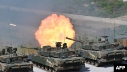 South Korea's K-2 tanks fire during a South Korea-U.S. joint military drill at Seungjin Fire Training Field in Pocheon, June 15, 2023.