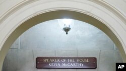 A sign still bearing the name of Rep. Kevin McCarthy, R-Calif., is seen outside the office of the Speaker of the House on Capitol Hill, Oct. 23, 2023, in Washington. 