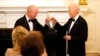 Utah Gov. Spencer Cox, left, and President Joe Biden toast before Biden speaks to members of the National Governors Association during an event in the State Dining Room of the White House in Washington, Feb. 24, 2024.