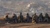  جنوبی اسرائیل میں غزہ کی پٹی کی سرحد کے قریب اسرائیلی فوجی پوزیشن لے رہے ہیں، فوٹو اے پی ، 11 دسمبر 2023