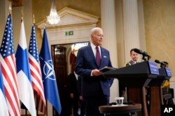 President Joe Biden arrives for a news conference with Finland's President Sauli Niinisto at the Presidential Palace in Helsinki, Finland, Thursday, July 13, 2023.