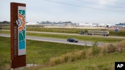 Traffic is shown on Interstate 35 near a Microsoft data center, Tuesday, Sept. 5, 2023, in West Des Moines, Iowa. (AP Photo/Charlie Neibergall)