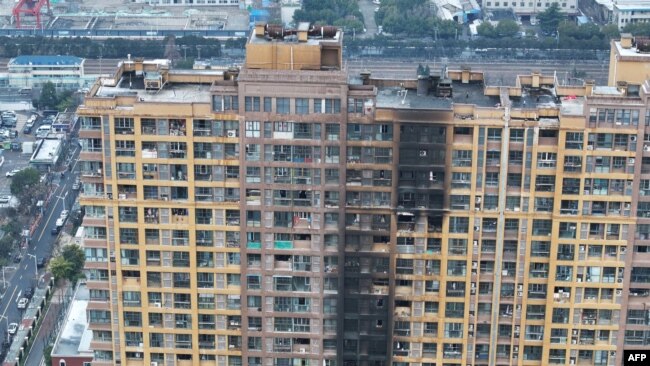 Aerial view of the fire at a residential building in Nanjing city, Jiangsu province, China, on Feb. 23, 2024.