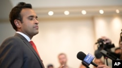 Republican presidential candidate Vivek Ramaswamy answers questions from reporters after speaking at the Republican Party of Florida Freedom Summit, Nov. 4, 2023, in Kissimmee, Fla.