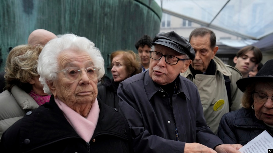 French Nazi hunter Serge Klarsfeld and Auschwitz survivor Esther Senot attend a gathering in the Paris Holocaust memorial to sound the alarm about resurgent antisemitism linked to the Israel-Hamas war, in Paris, Nov. 18, 2023.