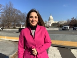 FILE - In this undated VOA photo, VOA writer  Cristina Caicedo Smit poses adjacent   the U.S. Capitol successful  Washington.