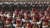 Para anggota militer berbaris dalam sebuah parade di Naypyitaw, Myanmar, pada 27 Maret 2023. (Foto: AP/Aung Shine Oo)