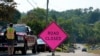 The road is blocked, July 14, 2024, to the Bethel Park, Pennsylvania, home believed to be connected to the shooter in the assassination attempt of Republican presidential candidate former President Donald Trump. 
