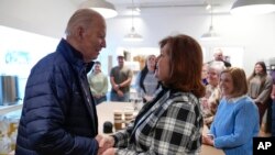 US President Joe Biden greets people during a stop at1820 Candle Co. in East Palestine, Ohio, Feb. 16, 2024. 