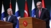 FILE - Turkish President Recep Tayyip Erdogan, right, and Finnish President Sauli Niinisto hold a joint press conference after their meeting at the Presidential Complex in Ankara, March 17, 2023. 