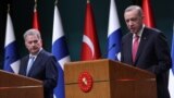 FILE - Turkish President Recep Tayyip Erdogan, right, and Finnish President Sauli Niinisto hold a joint press conference after their meeting at the Presidential Complex in Ankara, March 17, 2023. 